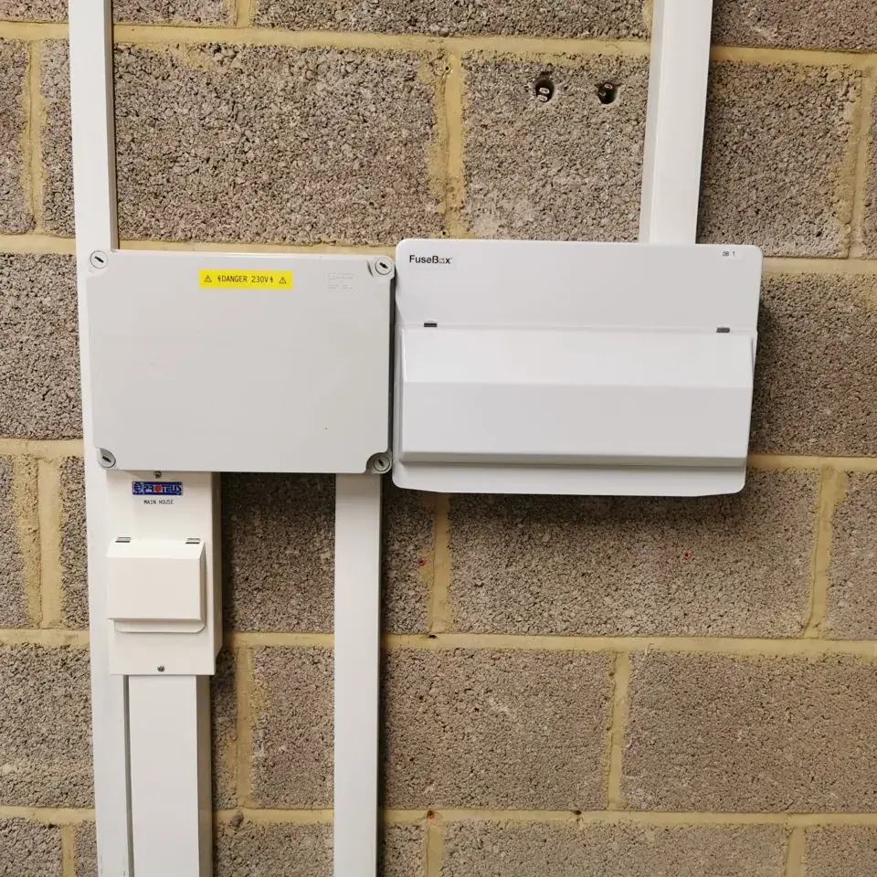 Wall-mounted electrical consumer units.